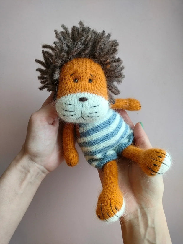 Knitted toy lion