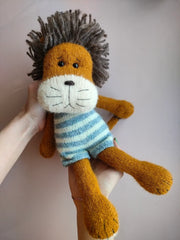 Knitted toy lion